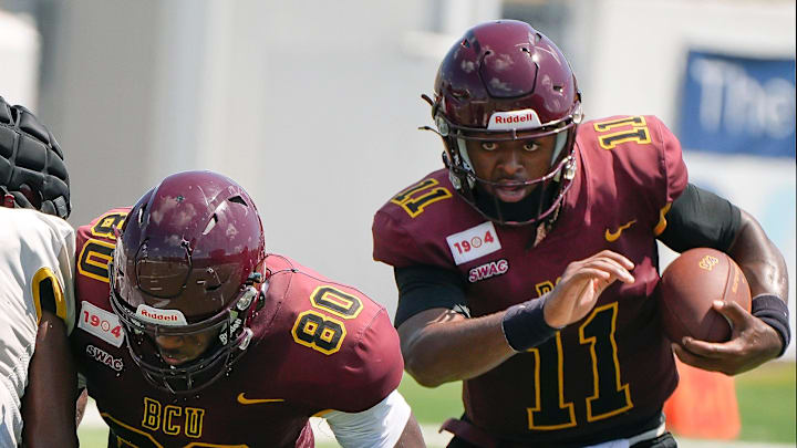 Cam Ransom (11) runs for yardage during a Bethune-Cookman football intrasquad scrimmage at Daytona Stadium, Saturday, Aug. 16, 2025