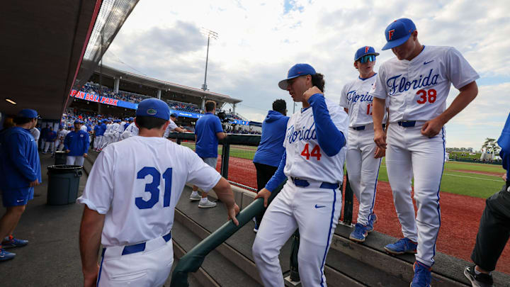 Florida players head to the dug out as the game against Texas A&M begins during an NCAA baseball game at Condron Family Ballpark at Alfred A. McKethan Field in Gainesville, FL on Friday, April 24, 2026. [Alan Youngblood/Gainesville Sun]