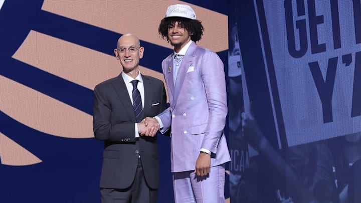 Jun 25, 2025; Brooklyn, NY, USA;  Asa Newell stands with NBA commissioner Adam Silver after being selected as the 23rd pick by the New Orleans Pelicans in the first round of the 2025 NBA Draft at Barclays Center. Mandatory Credit: Brad Penner-Imagn Images
