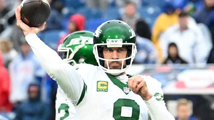Dec 29, 2024; Orchard Park, New York, USA; New York Jets quarterback Aaron Rodgers (8) warms up before a game against the Buffalo Bills at Highmark Stadium. Mandatory Credit: Mark Konezny-Imagn Images