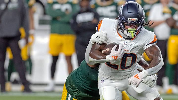 August 22, 2026, Denver, Colorado, USA: Broncos JONAH COLEMAN runs for tough yardage with a Packers defender all over him during the 2nd. Half at Empower Field at Mile High Friday evening. Packers beat the Broncos in Pre-Season 33-13. August 22, 2026, Denver, Colorado, USA: Broncos JONAH COLEMAN runs for tough yardage with a Packers defender all over him during the 2nd. Half at Empower Field at Mile High Friday evening. Packers beat the Broncos in Pre-Season 33-13.