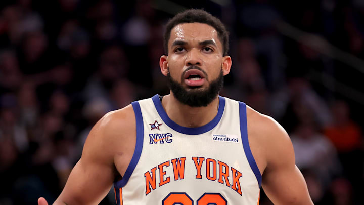 Feb 1, 2026; New York, New York, USA; New York Knicks center Karl-Anthony Towns (32) reacts during the second quarter against the Los Angeles Lakers at Madison Square Garden. Mandatory Credit: Brad Penner-Imagn Images