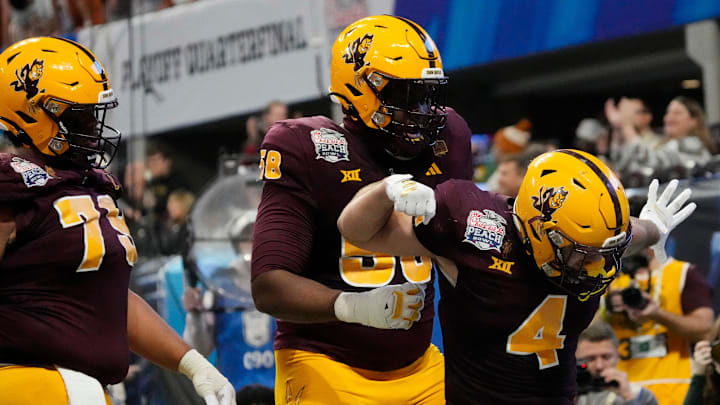 Arizona State running back Cam Skattebo (4) celebrates after a touchdown against Texas during the fourth quarter in the Chick-fil-A Peach Bowl in Atlanta on Wednesday, Jan. 1, 2025.