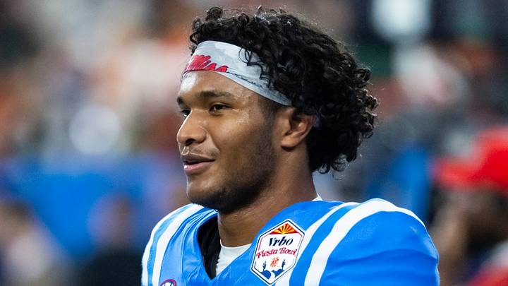Jan 8, 2026; Glendale, AZ, USA; Mississippi Rebels quarterback Austin Simmons (13) against the Miami Hurricanes during the 2026 Fiesta Bowl and semifinal game of the College Football Playoff at State Farm Stadium. Mandatory Credit: Mark J. Rebilas-Imagn Images Jan 8, 2026; Glendale, AZ, USA; Mississippi Rebels quarterback Austin Simmons (13) against the Miami Hurricanes during the 2026 Fiesta Bowl and semifinal game of the College Football Playoff at State Farm Stadium. Mandatory Credit: Mark J. Rebilas-Imagn Images