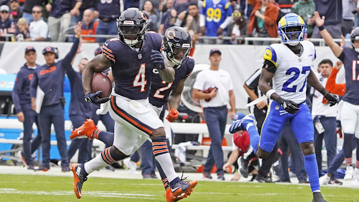 Sep 29, 2024; Chicago, Illinois, USA; Chicago Bears running back D'Andre Swift (4) runs for a touchdown  against the Los Angeles Rams during the second half at Soldier Field. Mandatory Credit: David Banks-Imagn Images