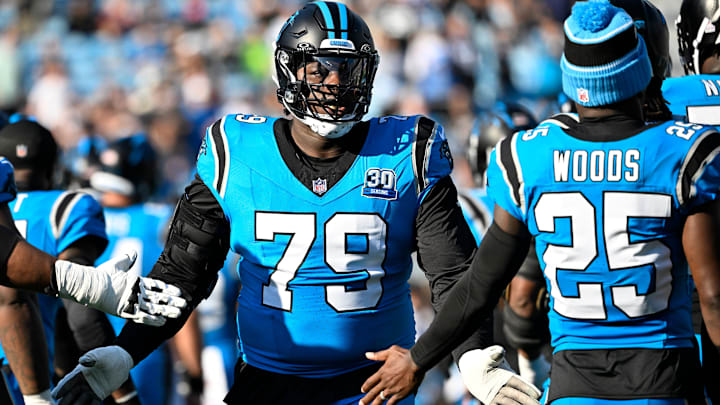 Oct 13, 2024; Charlotte, North Carolina, USA; Carolina Panthers offensive tackle Ikem Ekwonu (79) is introduced before the game at Bank of America Stadium. 