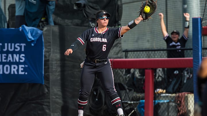 May 11, 2023; Fayetteville, AK, USA;  South Carolina Gamecocks infielder Jordan Fabian (6) catches the ball at first for an out during a quarterfinal game against the Georgia Bulldogs in the SEC Softball Tournament. Mandatory Credit: Brett Rojo-Imagn Images