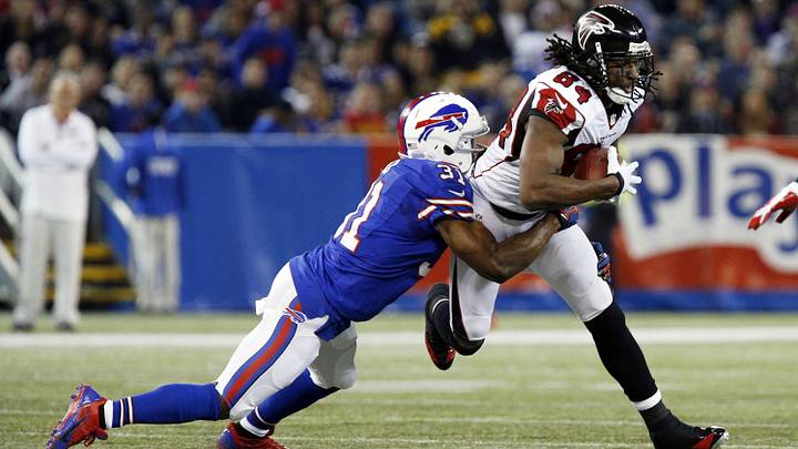 Dec 1, 2013; Toronto, ON, Canada; Buffalo Bills free safety Jairus Byrd (31) tackles Atlanta Falcons wide receiver Roddy White (84) during the first half at the Rogers Centre.