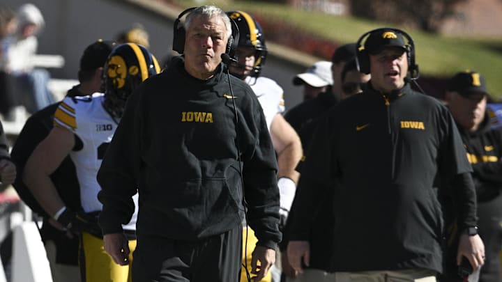 Nov 23, 2024; College Park, Maryland, USA; Iowa Hawkeyes head coach Kirk Ferentz looks onto the field during the first half against the Maryland Terrapins at SECU Stadium. Mandatory Credit: Tommy Gilligan-Imagn Images Nov 23, 2024; College Park, Maryland, USA; Iowa Hawkeyes head coach Kirk Ferentz looks onto the field during the first half against the Maryland Terrapins at SECU Stadium. Mandatory Credit: Tommy Gilligan-Imagn Images