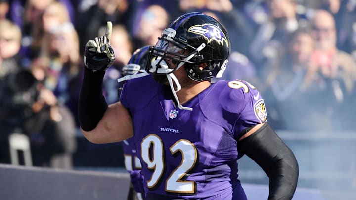 Nov 10, 2013; Baltimore, MD, USA; Baltimore Ravens defensive tackle Haloti Ngata (92) runs onto the field prior to the game against the Cincinnati Bengals at M&T Bank Stadium. Mandatory Credit: Evan Habeeb-Imagn Images