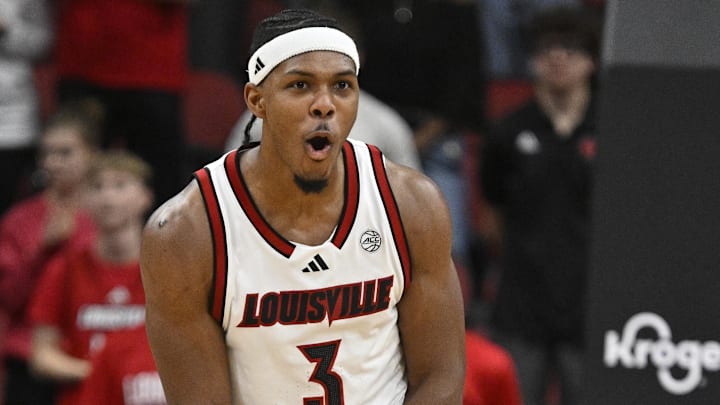Nov 15, 2025; Louisville, Kentucky, USA;  Louisville Cardinals guard Ryan Conwell (3) reacts after a play against Ohio Bobcats guard Jackson Paveletzke (13) during the second half at KFC Yum! Center. Louisville defeated Ohio 106-81. Mandatory Credit: Jamie Rhodes-Imagn Images