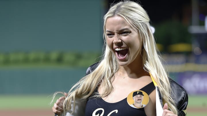 Louisiana State University gymnast Livvy Dunne reacts on the field after her boyfriend Pittsburgh Pirates starting pitcher Paul Skenes made his major league debut against the Chicago Cubs at PNC Park. Louisiana State University gymnast Livvy Dunne reacts on the field after her boyfriend Pittsburgh Pirates starting pitcher Paul Skenes made his major league debut against the Chicago Cubs at PNC Park.