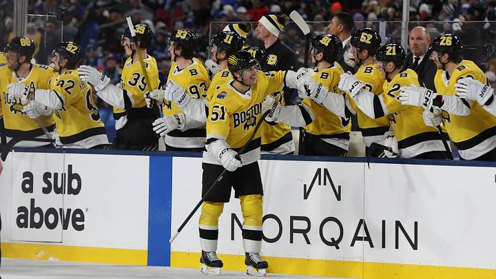 Feb 1, 2026; Tampa Bay, Florida, USA; Boston Bruins center Matthew Poitras (51) celebrates a goal against the Tampa Bay Lightning with the bench during the second period in the 2026 Stadium Series ice hockey game at Raymond James Stadium. Mandatory Credit: Kim Klement Neitzel-Imagn Images Feb 1, 2026; Tampa Bay, Florida, USA; Boston Bruins center Matthew Poitras (51) celebrates a goal against the Tampa Bay Lightning with the bench during the second period in the 2026 Stadium Series ice hockey game at Raymond James Stadium. Mandatory Credit: Kim Klement Neitzel-Imagn Images
