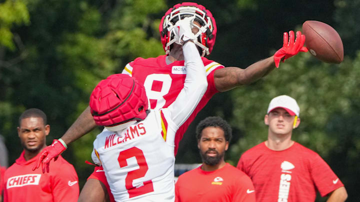 Kansas City Chiefs wide receiver Justyn Ross (8) drops a pass against cornerback Joshua Williams (2) during training camp at Missouri Western State University.
