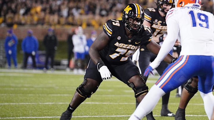 Missouri Tigers offensive lineman Armand Membou (79) at the line of scrimmage against the Florida Gators during the game at Faurot Field at Memorial Stadium. Missouri Tigers offensive lineman Armand Membou (79) at the line of scrimmage against the Florida Gators during the game at Faurot Field at Memorial Stadium.