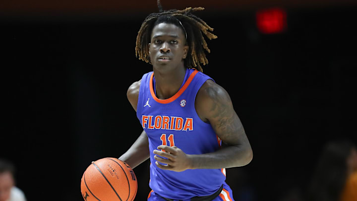 Feb 1, 2025; Knoxville, Tennessee, USA; Florida Gators guard Denzel Aberdeen (11) brings the ball up court against the Tennessee Volunteers during the second half at Thompson-Boling Arena at Food City Center. Mandatory Credit: Randy Sartin-Imagn Images
