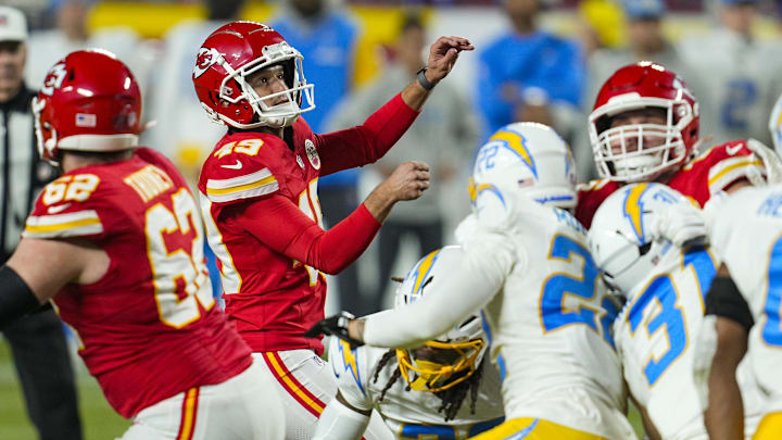 Dec 8, 2024; Kansas City, Missouri, USA; Kansas City Chiefs place kicker Matthew Wright (49) kicks a game winning field goal as time expires against the Los Angeles Chargers at GEHA Field at Arrowhead Stadium. Mandatory Credit: Jay Biggerstaff-Imagn Images Dec 8, 2024; Kansas City, Missouri, USA; Kansas City Chiefs place kicker Matthew Wright (49) kicks a game winning field goal as time expires against the Los Angeles Chargers at GEHA Field at Arrowhead Stadium. Mandatory Credit: Jay Biggerstaff-Imagn Images