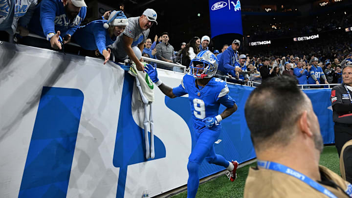 Dec 5, 2024; Detroit, Michigan, USA;  Detroit Lions wide receiver Jameson Williams (9) celebrates with fans in the end zone after catching a pass for a first down against the Green Bay Packers in the first quarter at Ford Field. Mandatory Credit: Lon Horwedel-Imagn Images