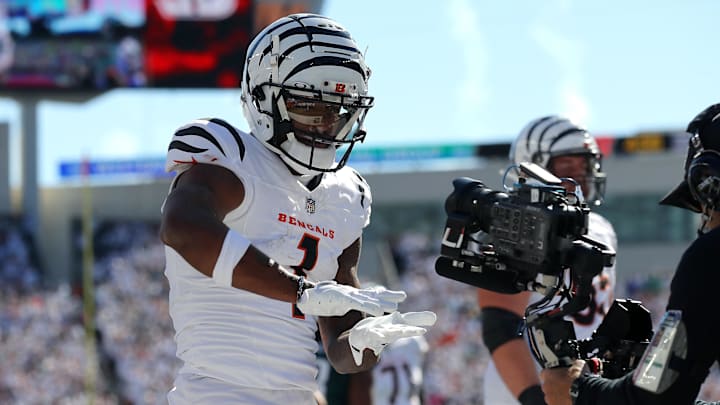 Oct 27, 2024; Cincinnati, Ohio, USA;  Cincinnati Bengals wide receiver Ja'Marr Chase (1) celebrates the touchdown catch during the first quarter against the Philadelphia Eagles at Paycor Stadium. Mandatory Credit: Joseph Maiorana-Imagn Images