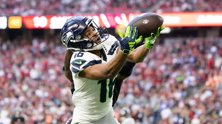 Dec 8, 2024; Glendale, Arizona, USA; Seattle Seahawks wide receiver Tyler Lockett (16) against the Arizona Cardinals at State Farm Stadium. Mandatory Credit: Mark J. Rebilas-Imagn Images