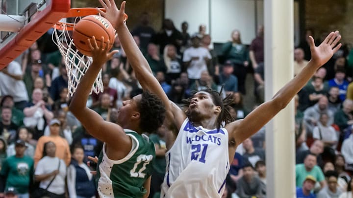 Richwoods' Marlon Herron goes to the basket against Harvey Thornton's Morez Johnson Jr. late in the second half of their Class 3A boys basketball supersectional Monday, March 4, 2024 at Ottawa High School. The Knights advanced to the state semifinals with a 58-52 win.