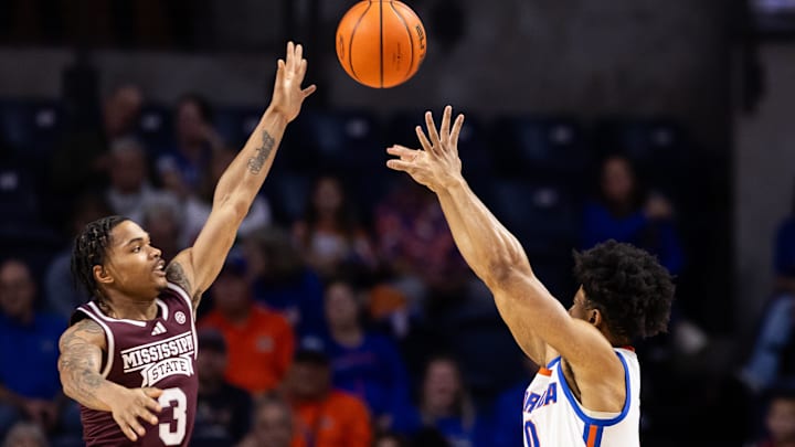Jan 24, 2024; Gainesville, Florida, USA; Florida Gators guard Zyon Pullin (0) makes a three-pointer