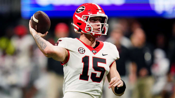 Dec 2, 2023; Atlanta, GA, USA; Georgia Bulldogs quarterback Carson Beck (15) throws a pass against the Alabama Crimson Tide in the third quarter of the SEC Championship at Mercedes-Benz Stadium. Mandatory Credit: John David Mercer-USA TODAY Sports Dec 2, 2023; Atlanta, GA, USA; Georgia Bulldogs quarterback Carson Beck (15) throws a pass against the Alabama Crimson Tide in the third quarter of the SEC Championship at Mercedes-Benz Stadium. Mandatory Credit: John David Mercer-USA TODAY Sports