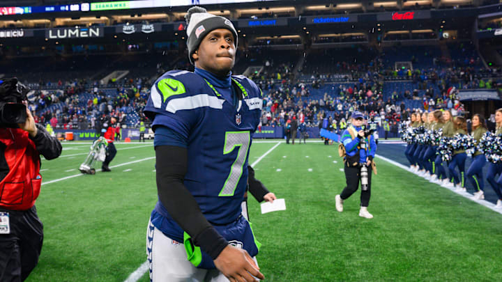 Nov 24, 2024; Seattle, Washington, USA; Seattle Seahawks quarterback Geno Smith (7) walks off the field after the game against the Arizona Cardinals at Lumen Field. 