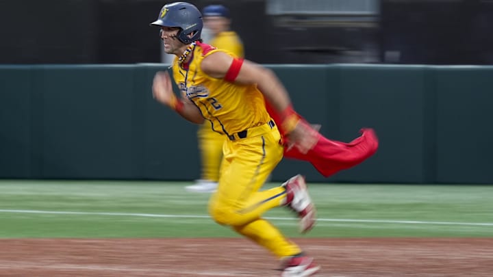 Jun 7, 2025; Charlotte, NC, USA;  Savannah Bananas outfielder Reese Alexiades (2) steals a base during the exhibition game against the Party Animals at Bank of America Stadium. Mandatory Credit: Jim Dedmon-Imagn Images