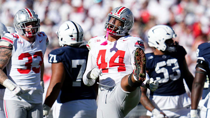 Ohio State Buckeyes defensive end JT Tuimoloau (44) celebrates a sack during the NCAA football game against the Penn State Nittany Lions at Beaver Stadium in University Park, Pa. on Monday, Nov. 4, 2024. Ohio State won 20-13. Ohio State Buckeyes defensive end JT Tuimoloau (44) celebrates a sack during the NCAA football game against the Penn State Nittany Lions at Beaver Stadium in University Park, Pa. on Monday, Nov. 4, 2024. Ohio State won 20-13.