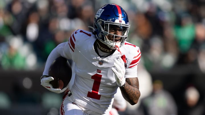 Jan 5, 2025; Philadelphia, Pennsylvania, USA; New York Giants wide receiver Malik Nabers (1) runs with the ball against the Philadelphia Eagles during the first quarter at Lincoln Financial Field.  