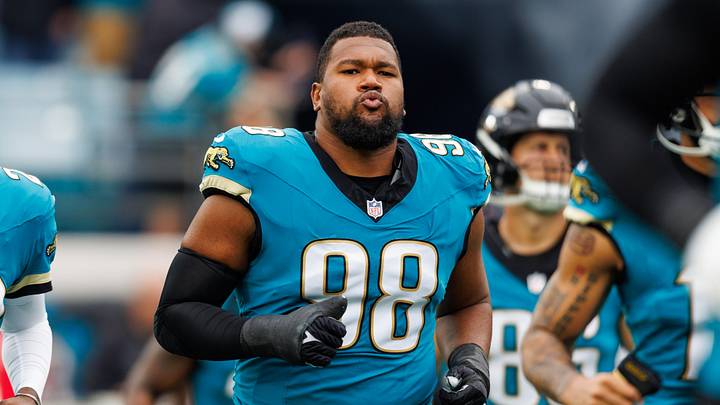Jan 4, 2026; Jacksonville, Florida, USA; Jacksonville Jaguars defensive end Dawuane Smoot (98) runs out of the tunnel before the game against the Tennessee Titans at EverBank Stadium. Jan 4, 2026; Jacksonville, Florida, USA; Jacksonville Jaguars defensive end Dawuane Smoot (98) runs out of the tunnel before the game against the Tennessee Titans at EverBank Stadium.