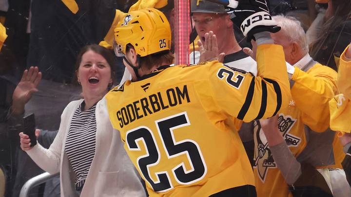 Apr 27, 2026; Pittsburgh, Pennsylvania, USA;  Pittsburgh Penguins left wing Elmer Soderblom (25) celebrates his goal with Penguins fans against the Philadelphia Flyers during the first period in game five of the first round of the 2026 Stanley Cup Playoffs at PPG Paints Arena. Mandatory Credit: Charles LeClaire-Imagn Images