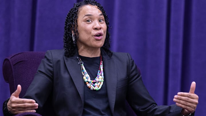 University of South Carolina women's basketball coach Dawn Staley answers a question by moderator Dan Hughes during the University of Mount Union's Schooler Lecture speaker series on April 23, 2025, in Alliance, Ohio.