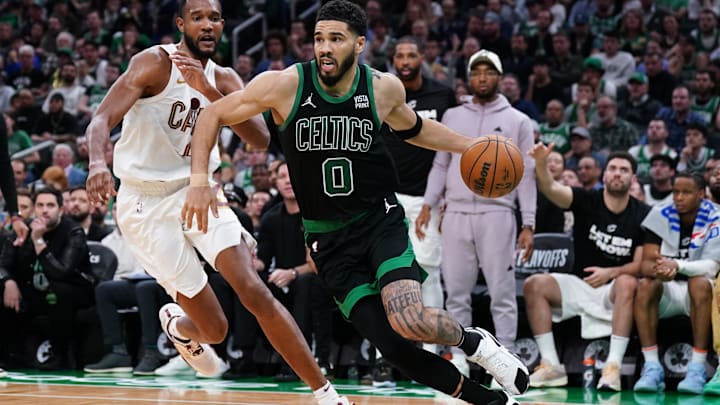 May 15, 2024; Boston, Massachusetts, USA; Boston Celtics forward Jayson Tatum (0) drives the ball against Cleveland Cavaliers forward Evan Mobley (4) in the third quarter during game five of the second round for the 2024 NBA playoffs at TD Garden. Mandatory Credit: David Butler II-USA TODAY Sports