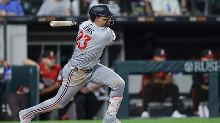 Aug 22, 2025; Chicago, Illinois, USA; Minnesota Twins third baseman Royce Lewis (23) singles against the Chicago White Sox during the ninth inning at Rate Field. Aug 22, 2025; Chicago, Illinois, USA; Minnesota Twins third baseman Royce Lewis (23) singles against the Chicago White Sox during the ninth inning at Rate Field.