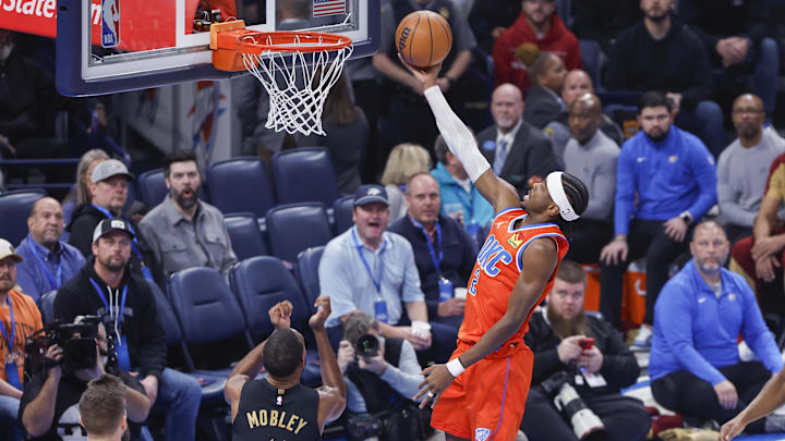 Jan 16, 2025; Oklahoma City, Oklahoma, USA; Oklahoma City Thunder guard Shai Gilgeous-Alexander (2) goes to the basket against the Cleveland Cavaliers during the first quarter at Paycom Center. Mandatory Credit: Alonzo Adams-Imagn Images Jan 16, 2025; Oklahoma City, Oklahoma, USA; Oklahoma City Thunder guard Shai Gilgeous-Alexander (2) goes to the basket against the Cleveland Cavaliers during the first quarter at Paycom Center. Mandatory Credit: Alonzo Adams-Imagn Images