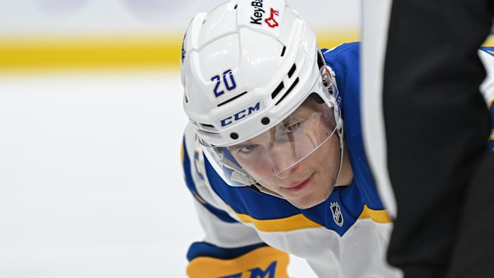 Oct 25, 2025; Toronto, Ontario, CAN; Buffalo Sabres center Jiri Kulich (20) in the face-off circle against the Toronto Maple Leafs during the second period at Scotiabank Arena. Mandatory Credit: Gerry Angus-Imagn Images