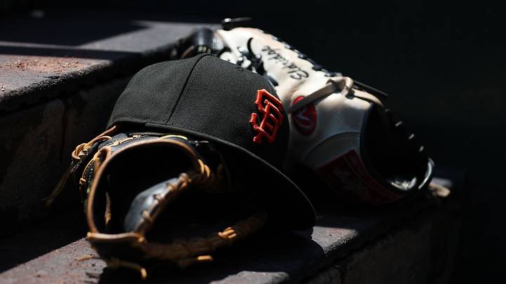A hat and glove used by the San Francisco Giants A hat and glove used by the San Francisco Giants
