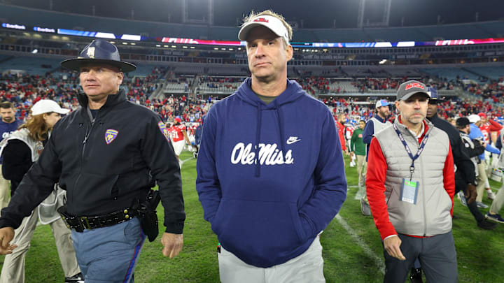 Jan 2, 2025; Mississippi Rebels head coach Lane Kiffin celebrates after beating the Duke Blue Devils in the Gator Bowl at EverBank Stadium. Jan 2, 2025; Mississippi Rebels head coach Lane Kiffin celebrates after beating the Duke Blue Devils in the Gator Bowl at EverBank Stadium.