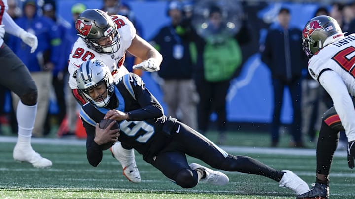 Jan 7, 2024; Charlotte, North Carolina, USA; Tampa Bay Buccaneers linebacker Yaya Diaby (90) sacks Carolina Panthers quarterback Bryce Young (9) during the second half at Bank of America Stadium. Mandatory Credit: Jim Dedmon-Imagn Images Jan 7, 2024; Charlotte, North Carolina, USA; Tampa Bay Buccaneers linebacker Yaya Diaby (90) sacks Carolina Panthers quarterback Bryce Young (9) during the second half at Bank of America Stadium. Mandatory Credit: Jim Dedmon-Imagn Images