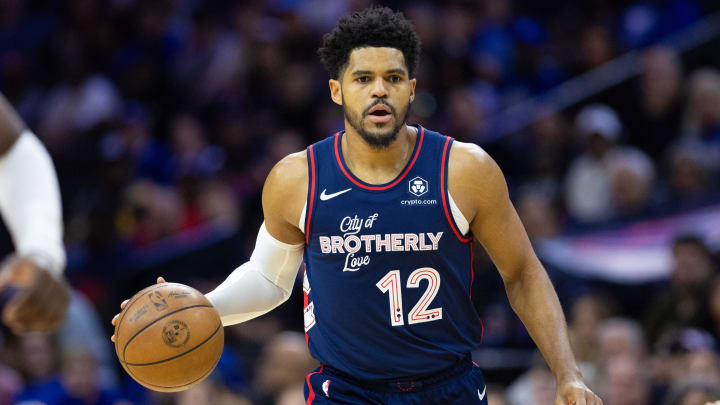 Apr 9, 2024; Philadelphia, Pennsylvania, USA; Philadelphia 76ers forward Tobias Harris (12) dribbles the ball against the Detroit Pistons during the first quarter at Wells Fargo Center.