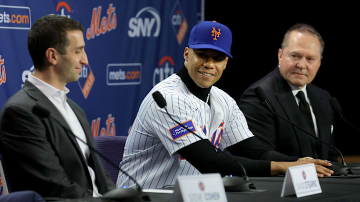 Dec 12, 2024; Flushing, NY, USA; New York Mets right fielder Juan Soto meets the media with general manager David Stearns (left) and agent Scott Boras (right) during a press conference at Citi Field. Mandatory Credit: Brad Penner-Imagn Images