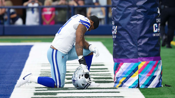 Dallas Cowboys linebacker Micah Parsons prays before the game against the New England Patriots. Dallas Cowboys linebacker Micah Parsons prays before the game against the New England Patriots.