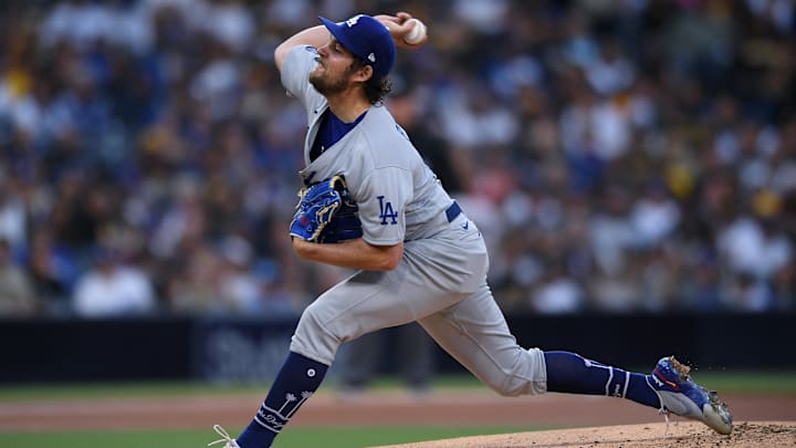 Jun 23, 2021; San Diego, California, USA; Los Angeles Dodgers starting pitcher Trevor Bauer (27) throws a pitch against the San Diego Padres during the first inning at Petco Park. Mandatory Credit: Orlando Ramirez-Imagn Images