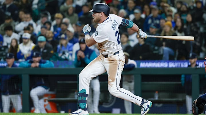 Seattle Mariners right fielder Luke Raley hits a single during a game against the Houston Astros on April 8 at T-Mobile Park. Seattle Mariners right fielder Luke Raley hits a single during a game against the Houston Astros on April 8 at T-Mobile Park.