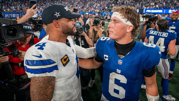New York Giants quarterback Jaxson Dart and Dallas Cowboys quarterback Dak Prescott meet on the field at MetLife Stadium New York Giants quarterback Jaxson Dart and Dallas Cowboys quarterback Dak Prescott meet on the field at MetLife Stadium