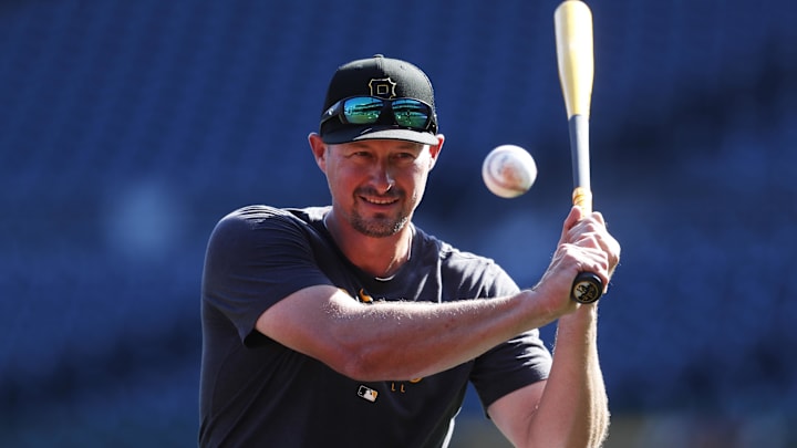 Sep 4, 2023; Pittsburgh, Pennsylvania, USA; Pittsburgh Pirates bench coach Don Kelly (12) participates in infield practice before the game against the Milwaukee Brewers at PNC Park. Mandatory Credit: Charles LeClaire-Imagn Images
