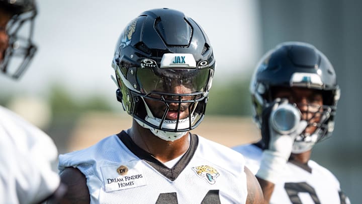 Jacksonville Jaguars defensive end Josh Hines-Allen (41) talks to a teammate while runing through drills during the seventh organized team activity at the Miller Electric Center in Jacksonville, Fla. Monday, June 2, 2025. [Doug Engle/Florida Times-Union]