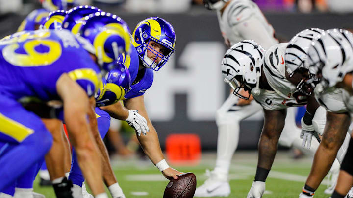 Sep 25, 2023; Cincinnati, Ohio, USA; Los Angeles Rams guard Coleman Shelton (65) prepares to snap the ball against the Cincinnati Bengals in the first half at Paycor Stadium. Mandatory Credit: Katie Stratman-Imagn Images